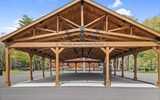 A wooden covered pavilion.